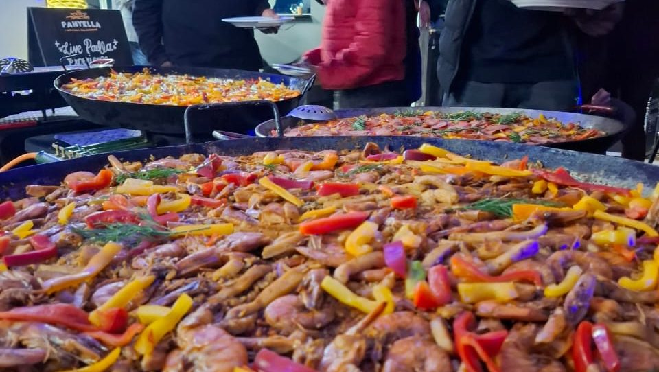 Seafood paella served at a night market or event venue