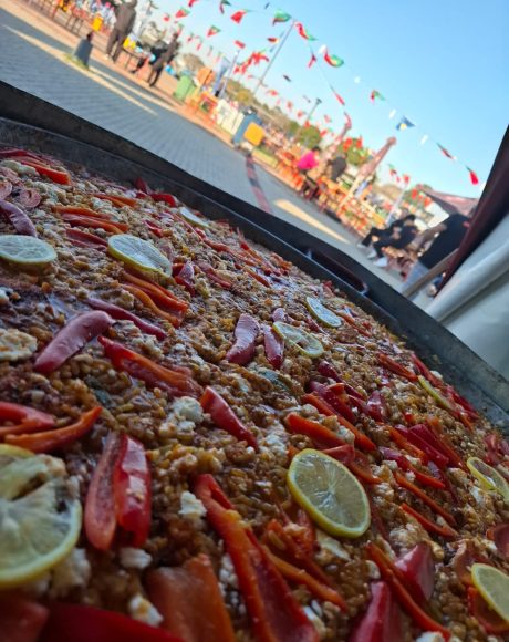 Traditional paella pan served fresh at Portuguese Festival