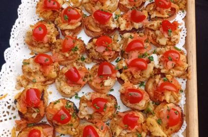 Gourmet bruschetta tapas platter with seafood and cherry tomatoes